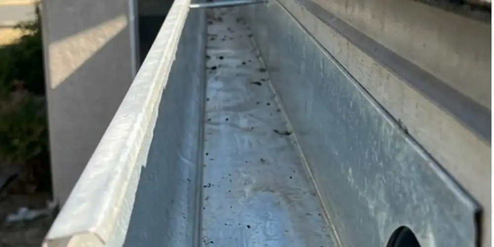 Roof drain cleared after commercial gutter cleaning Sacramento