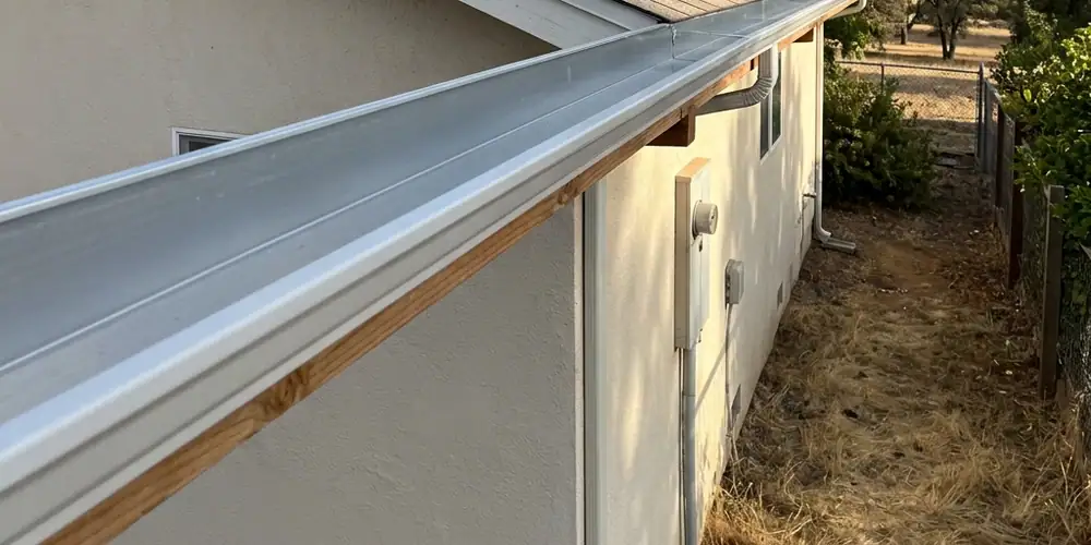 Long gutter run cleaned after commercial gutter cleaning Sacramento