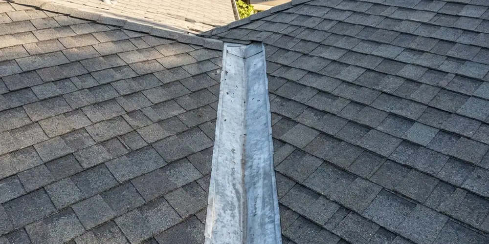 Roof valley cleared after gutter cleaning in Carmichael