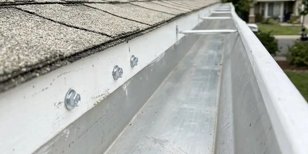 Aging hangers re-secured after gutter cleaning in Rancho Cordova