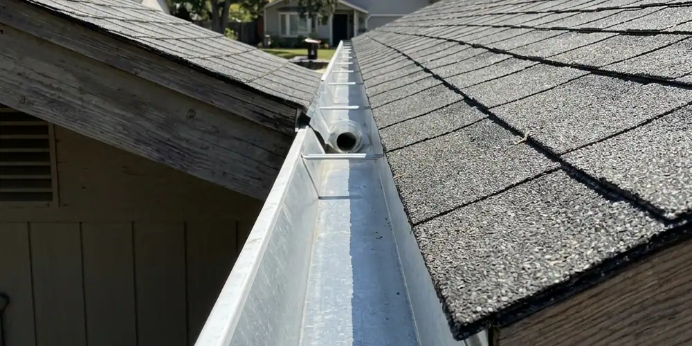 Pine needle mat removed after gutter cleaning in Roseville