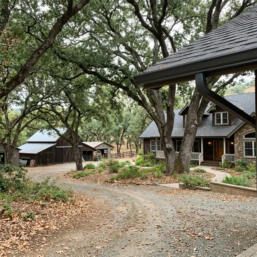 Large Fair Oaks property with outbuildings under mature oak canopy — gutter cleaning in Fair Oaks